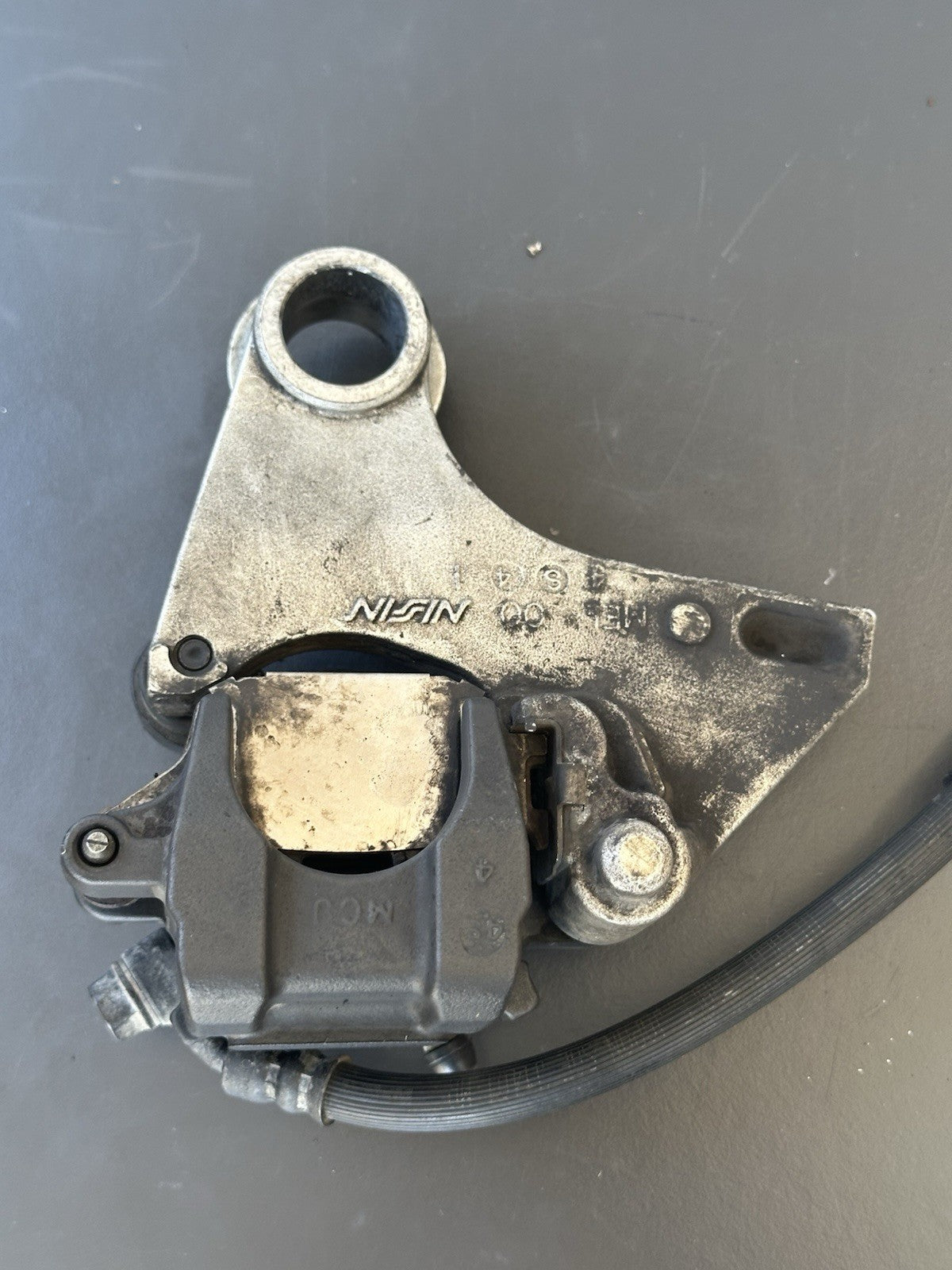 HONDA CBR1000RR REAR BRAKE CALIPER WITH BRACKET 2004 2005 RR4 RR5 CBR1000RR OEM
