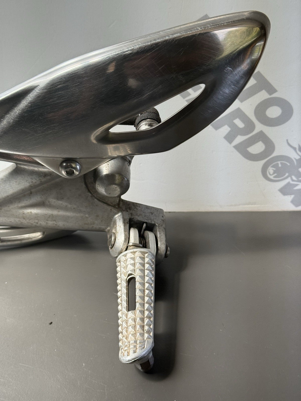 TRIUMPH STREET TRIPLE 675 675R Left Footrest Left Foot Hanger 2007-11 BENT PEDAL