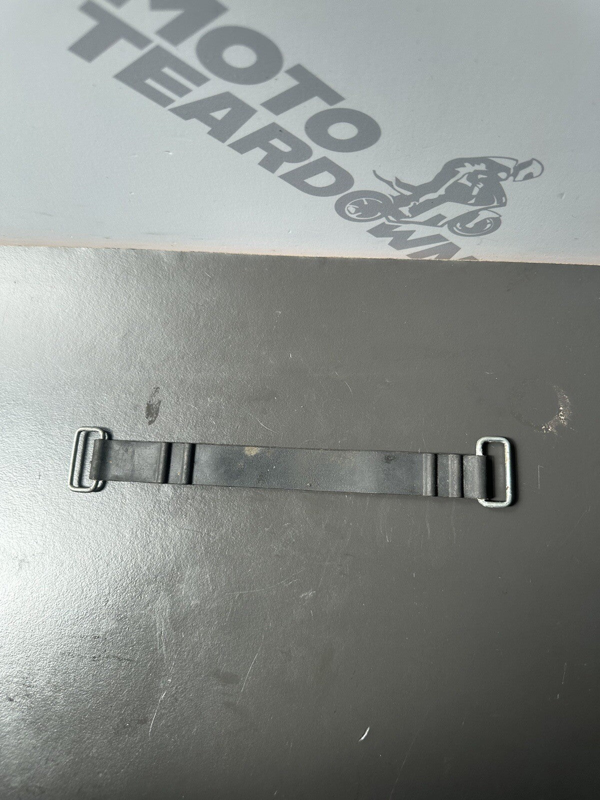TRIUMPH STREET TRIPLE 675 BATTERY STRAP 2013 - 2016 T2501789 12,409 Miles Strap