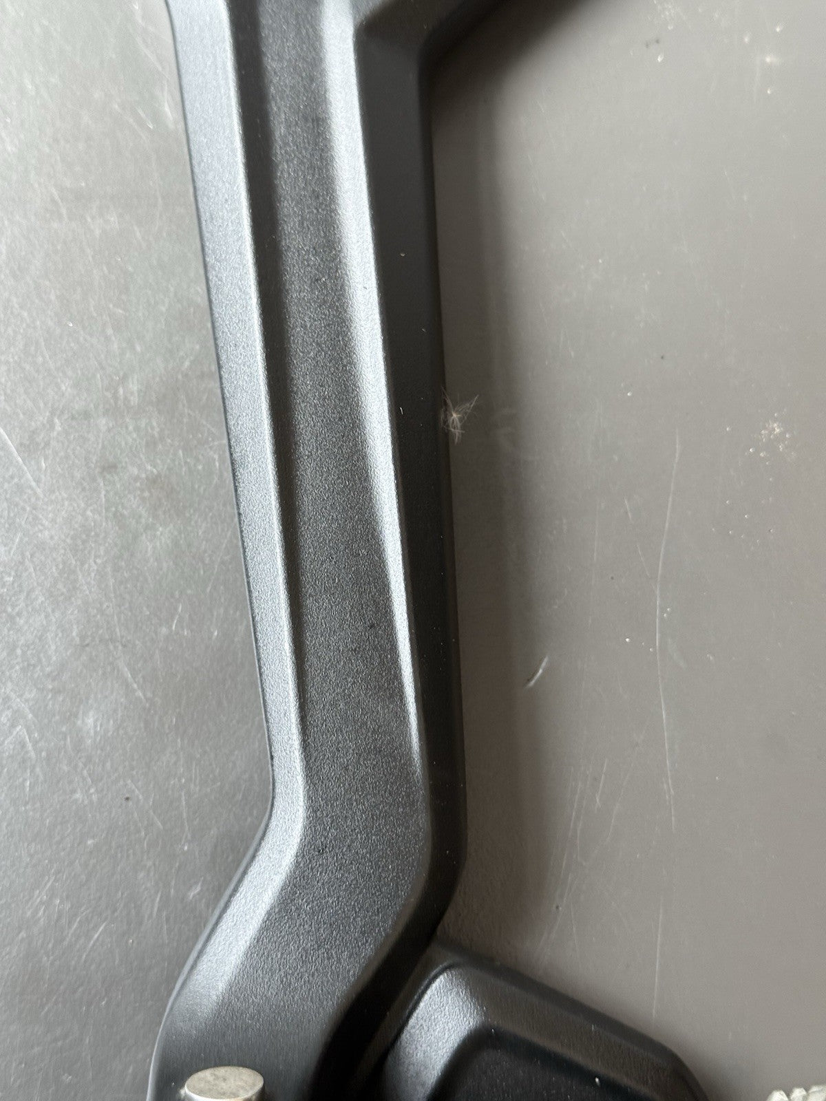 TRIUMPH TRIDENT 660 Left Rear Footrest Hanger - T2086605 2021-2024 Left Footrest