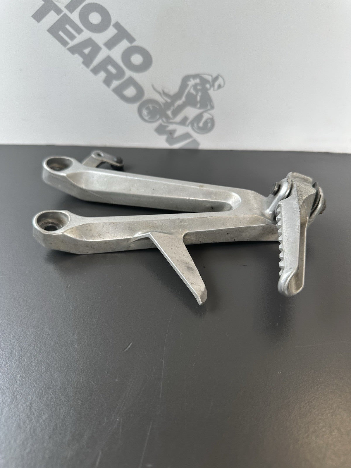 Honda CBR1000RR Fireblade right pillion footrest Right Foot Hanger 2004-2005 OEM
