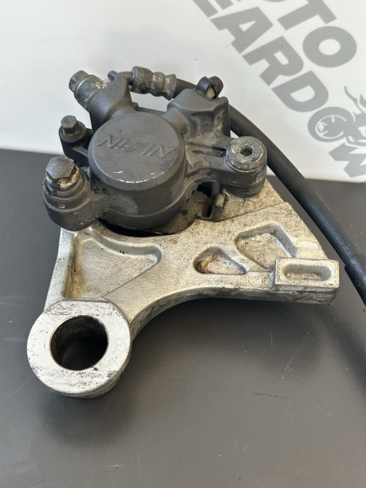 HONDA CBR1000RR REAR BRAKE CALIPER WITH BRACKET 2004 2005 RR4 RR5 CBR1000RR OEM