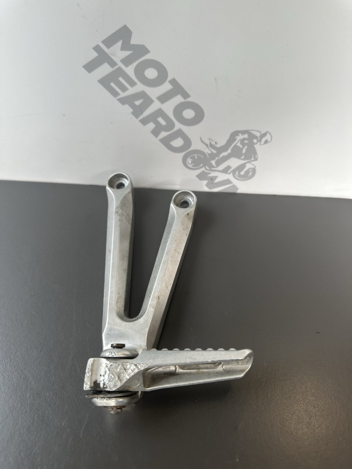 Honda CBR1000RR Fireblade Left pillion footrest Left Foot Hanger 2004-2005 OEM