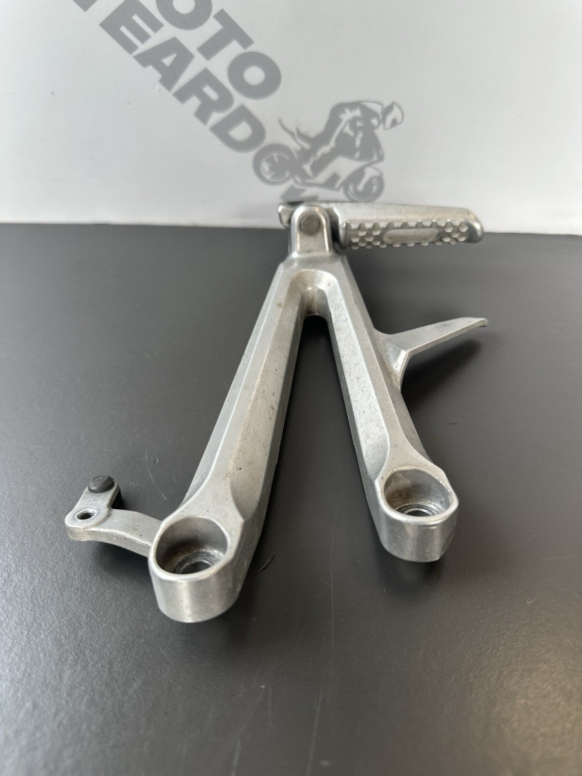 Honda CBR1000RR Fireblade right pillion footrest Right Foot Hanger 2004-2005 OEM