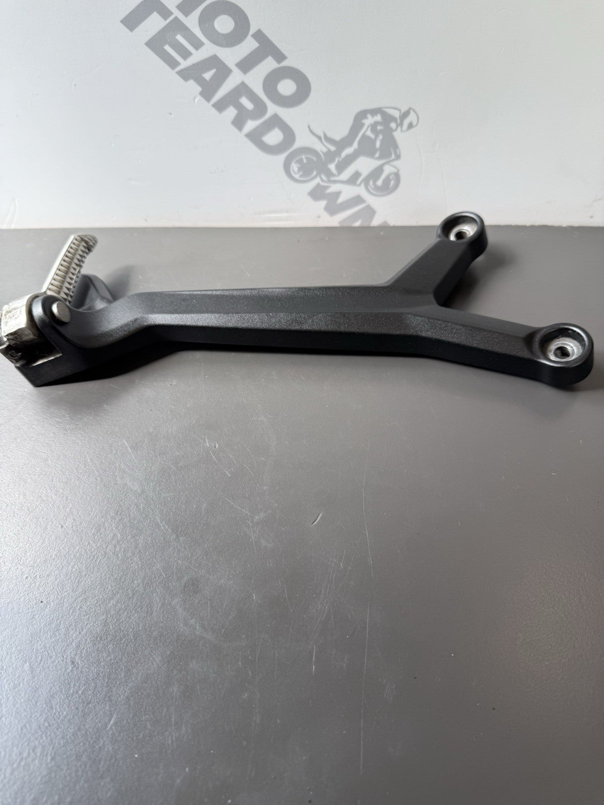 TRIUMPH TRIDENT 660 Right Rear Footrest Hanger - T2086606 2021-2024 RT Footrest