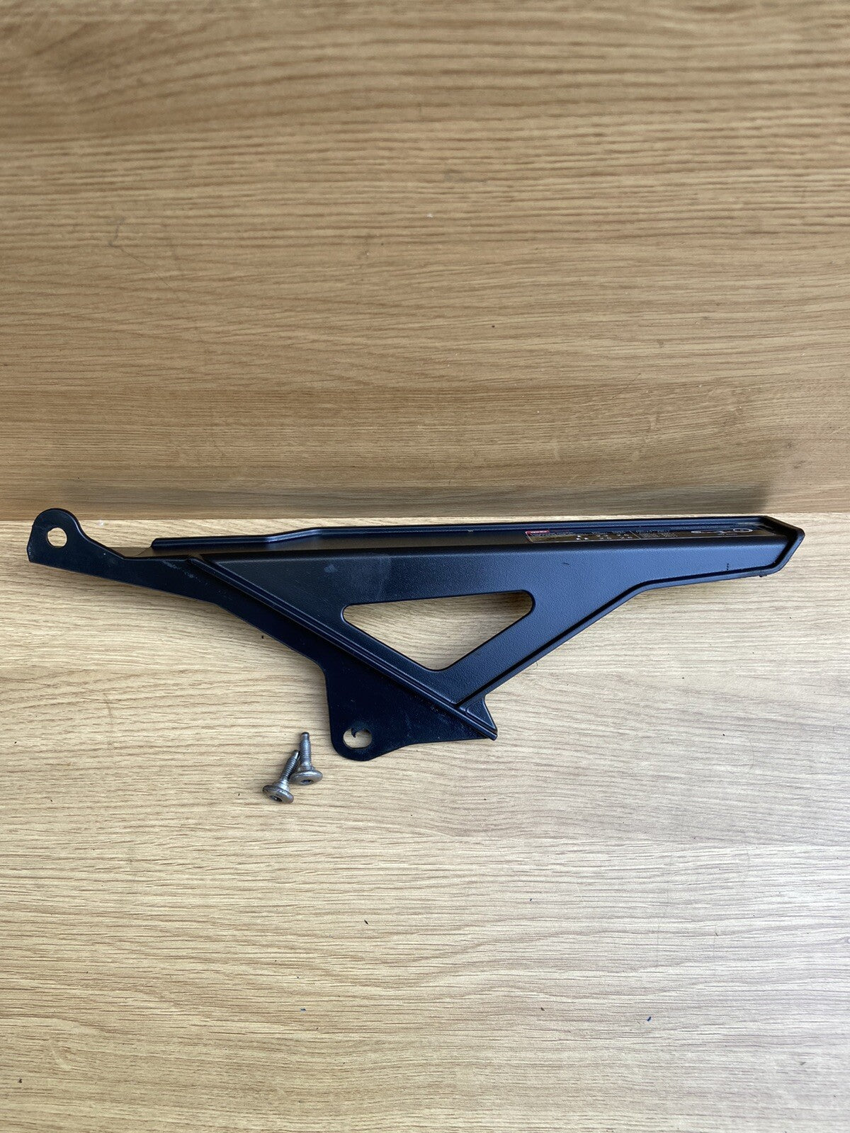 Aprilia Tuono V4 1100 Chain Guard with fixing bolts Part no 858783 Chain Guard