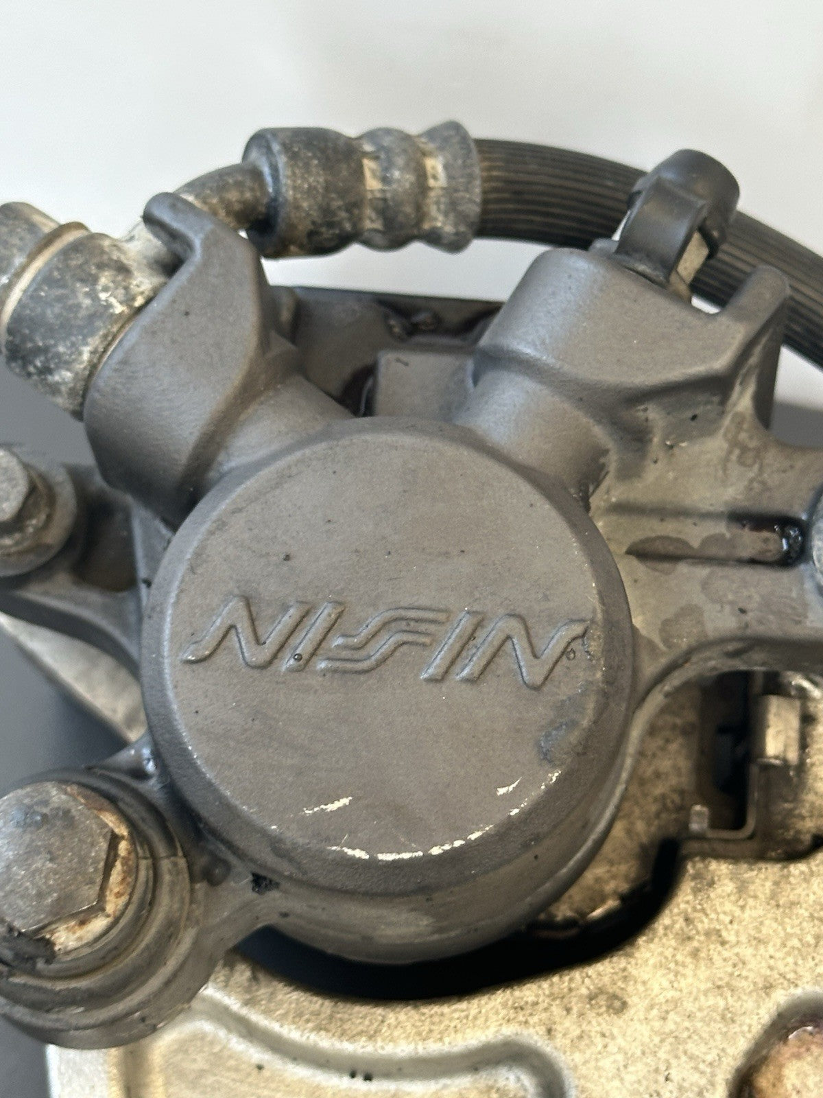 HONDA CBR1000RR REAR BRAKE CALIPER WITH BRACKET 2004 2005 RR4 RR5 CBR1000RR OEM