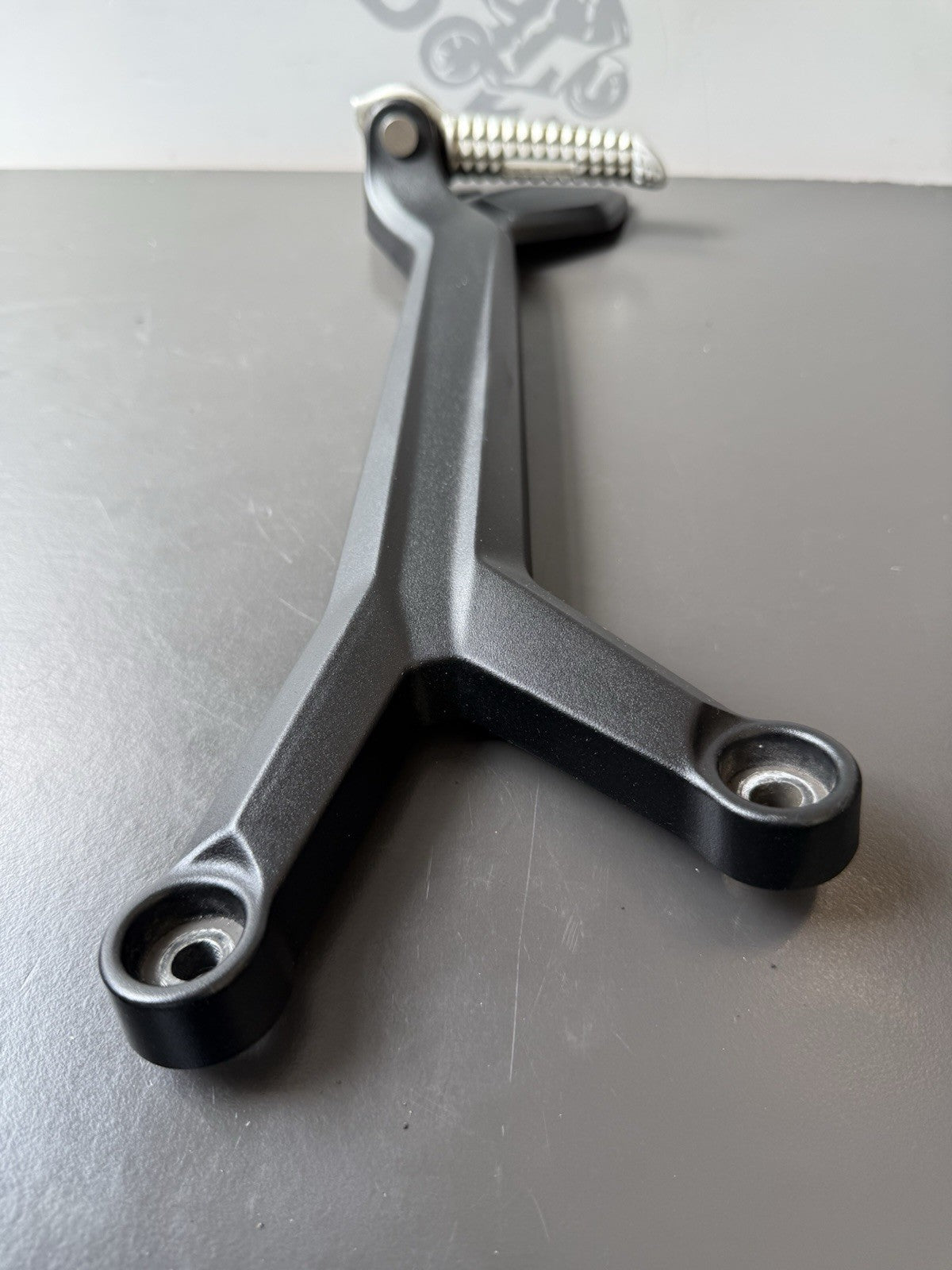 TRIUMPH TRIDENT 660 Right Rear Footrest Hanger - T2086606 2021-2024 RT Footrest