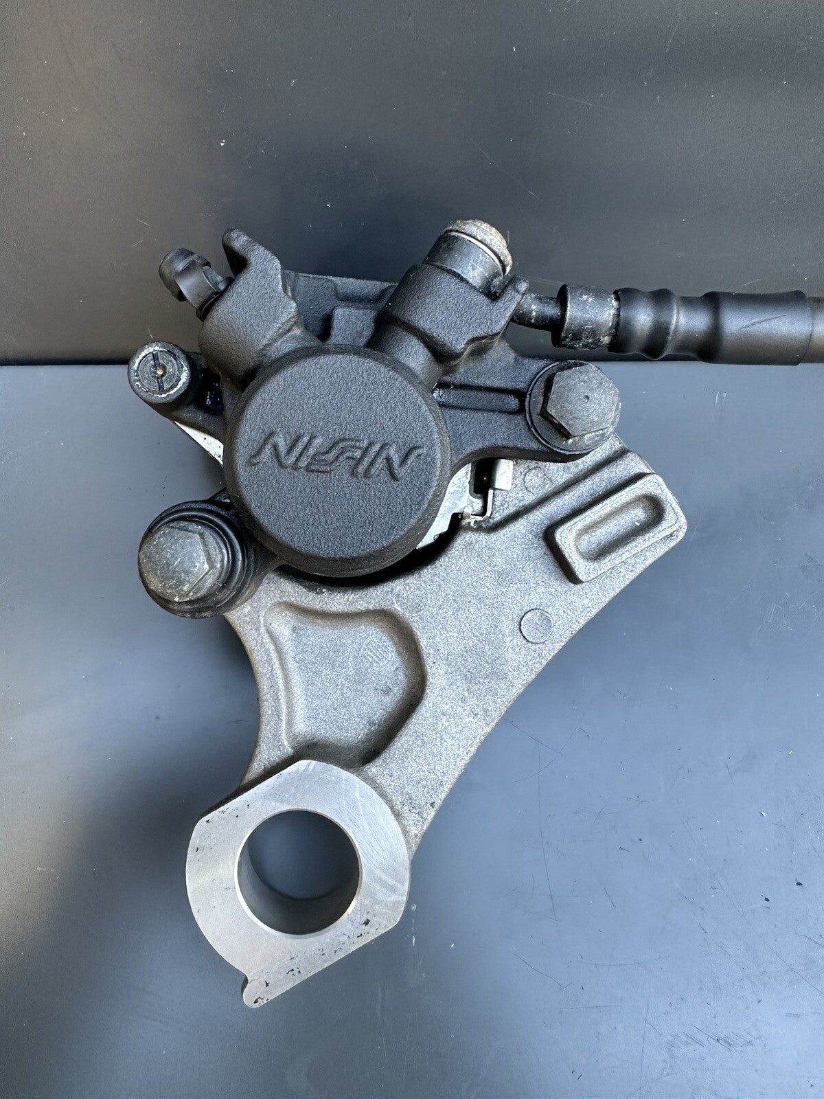 YAMAHA YZF R1 REAR BRAKE CALLIPER CALIPER WITH HANGER BRACKET 09-14 OEM R1 Brake