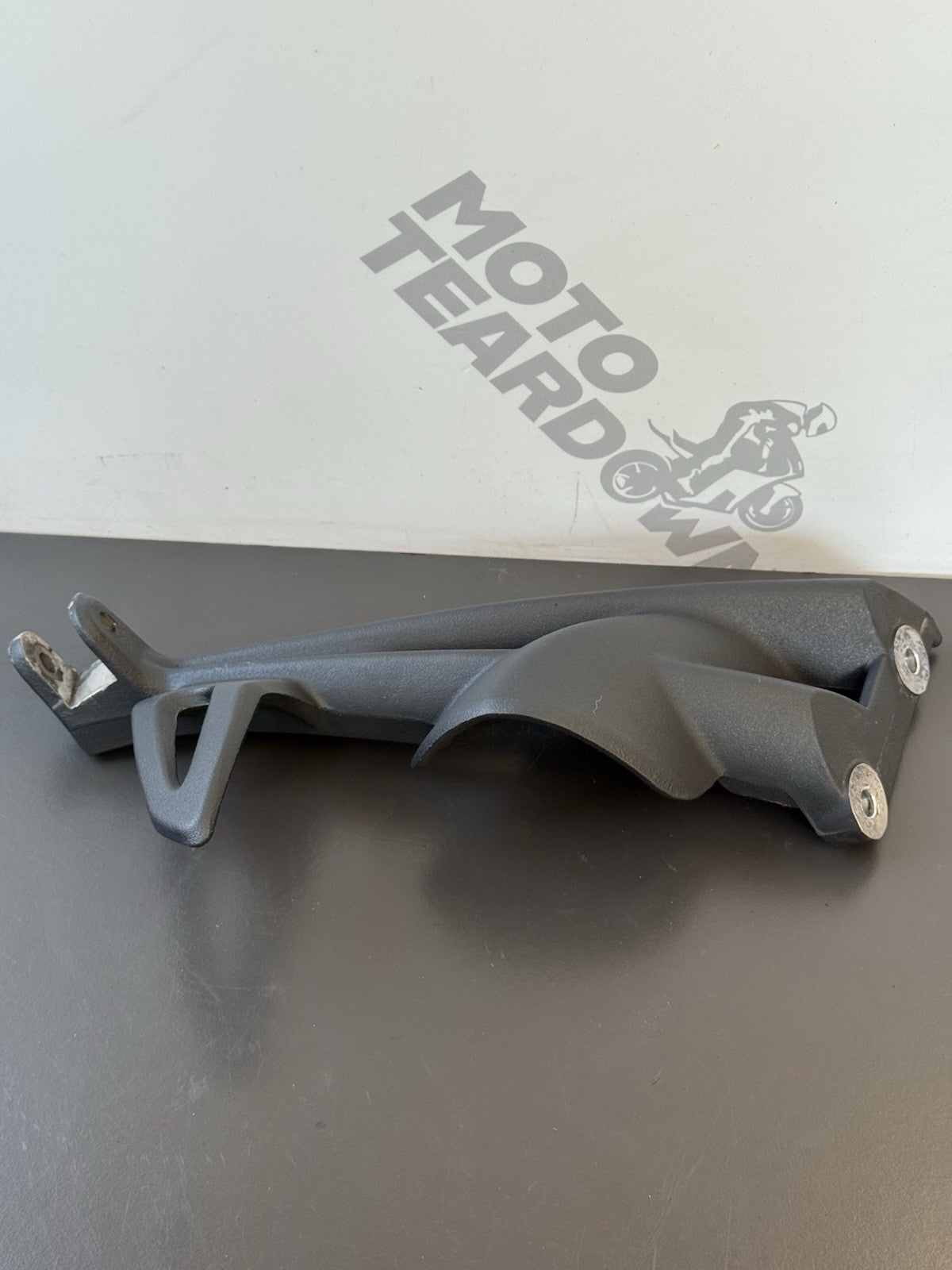 Triumph Street Triple 675R Rear Left Footrest Hanger - T2082091 2008-2011 OEM