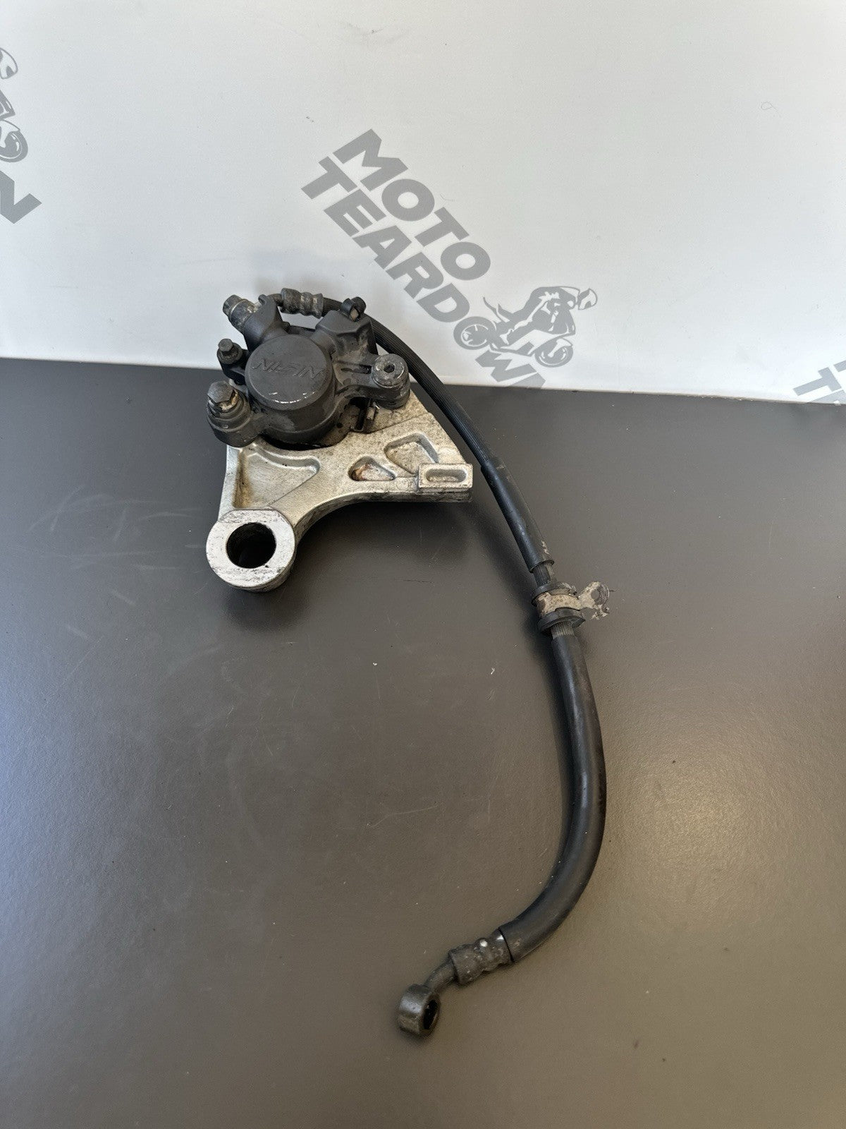 HONDA CBR1000RR REAR BRAKE CALIPER WITH BRACKET 2004 2005 RR4 RR5 CBR1000RR OEM