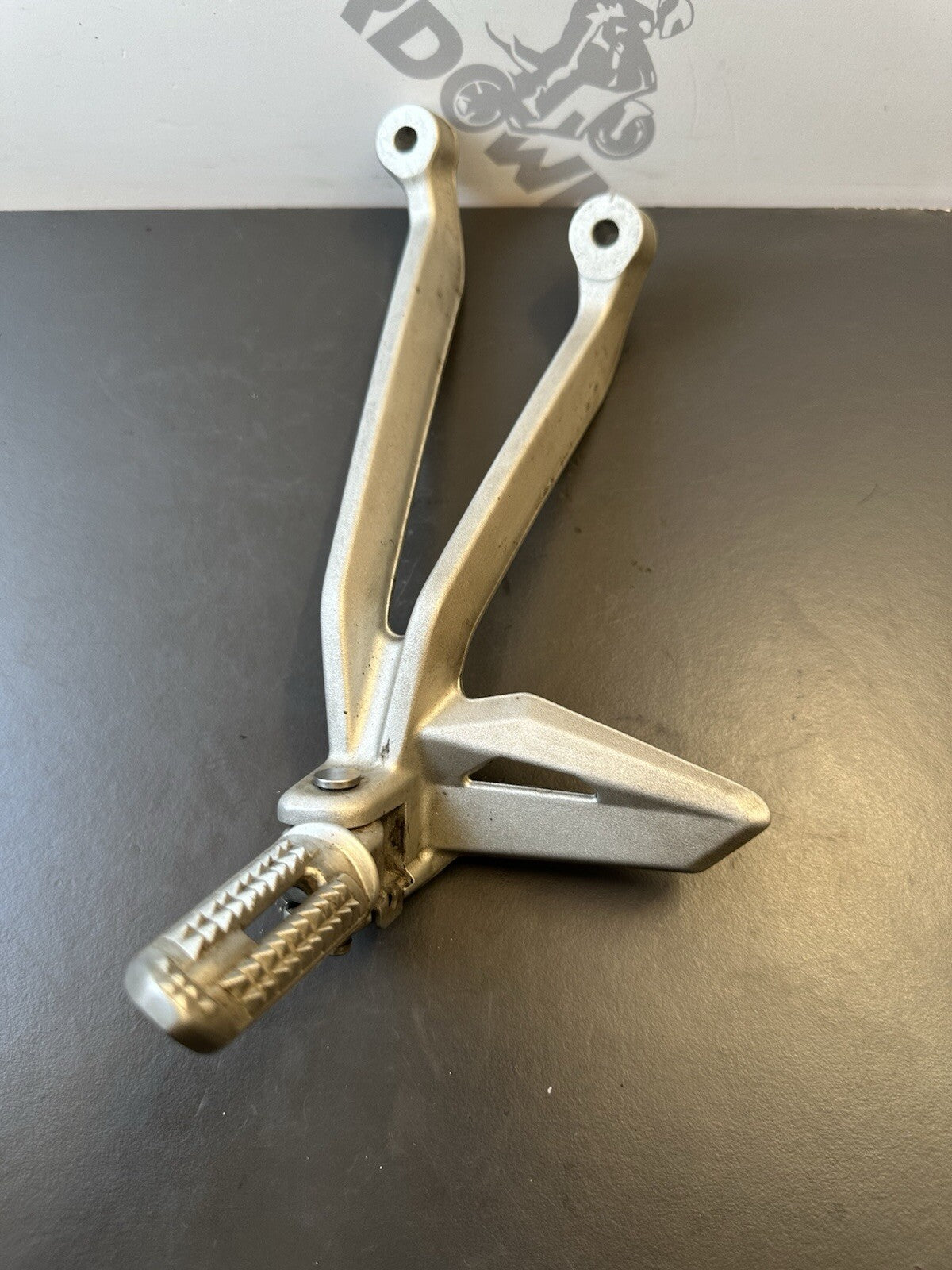 TRIUMPH STREET TRIPLE 765S 765RS Left Pillion Footrest Hanger - T2081987 2017-19