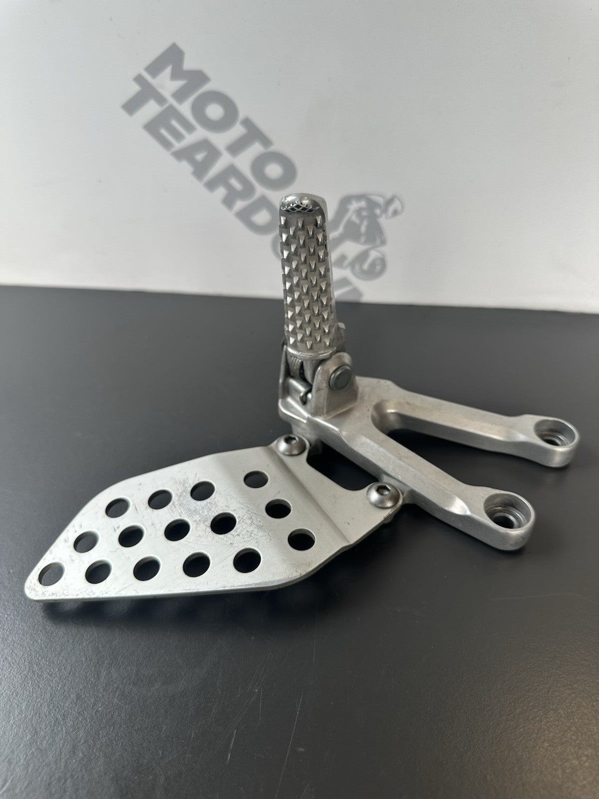 Honda CBR1000RR fireblade left front footrest hanger bracket peg 2004 - 2005 OEM