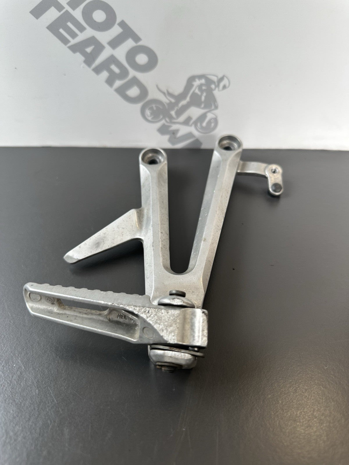 Honda CBR1000RR Fireblade right pillion footrest Right Foot Hanger 2004-2005 OEM