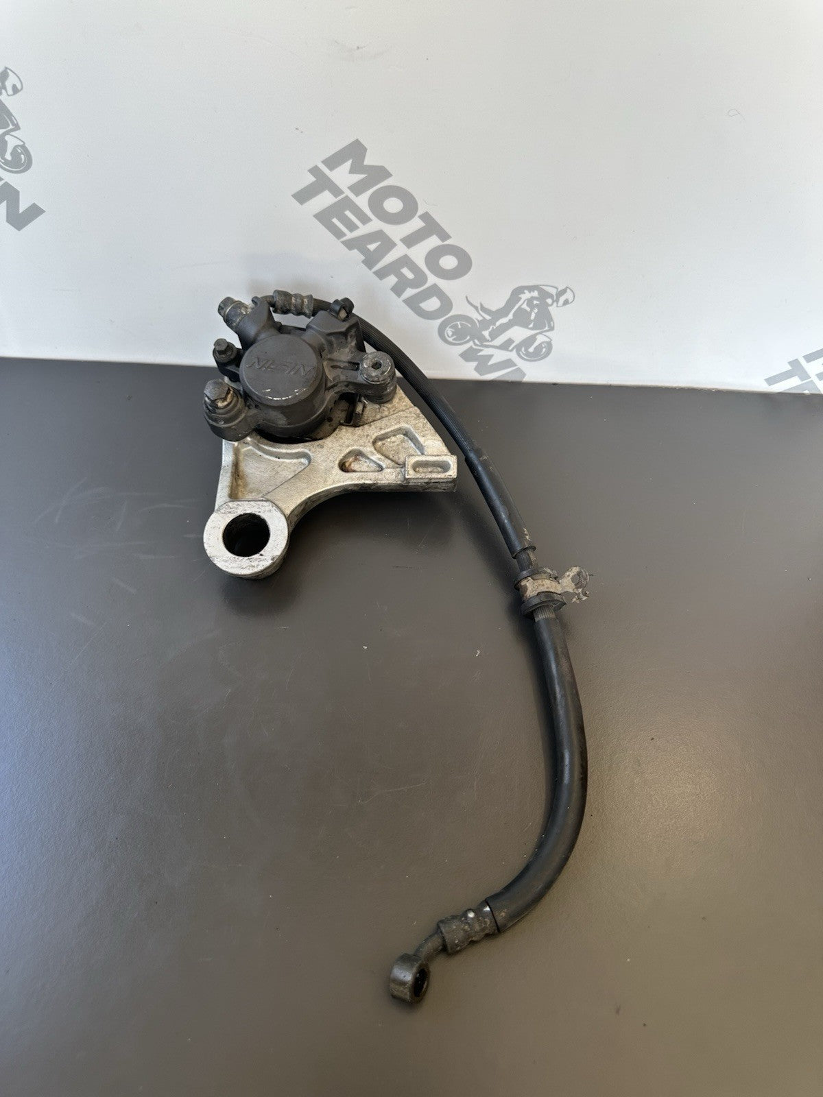 HONDA CBR1000RR REAR BRAKE CALIPER WITH BRACKET 2004 2005 RR4 RR5 CBR1000RR OEM