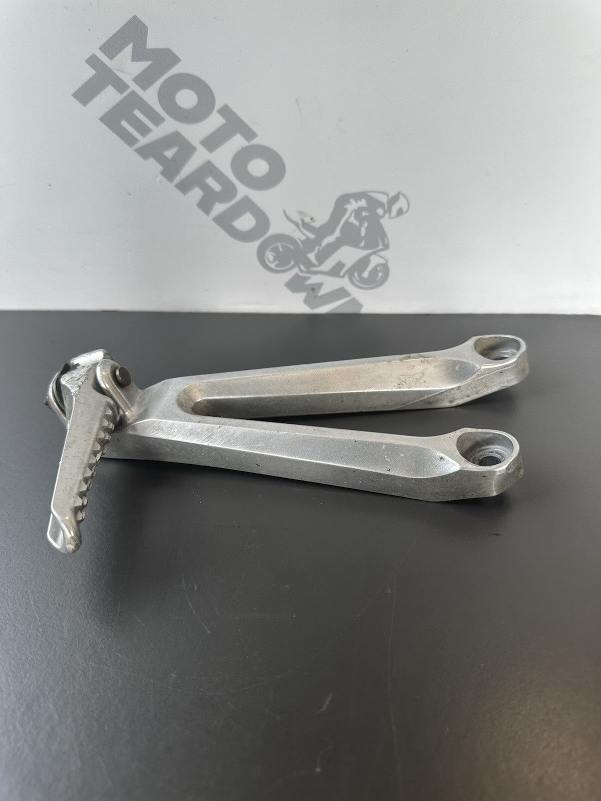 Honda CBR1000RR Fireblade Left pillion footrest Left Foot Hanger 2004-2005 OEM