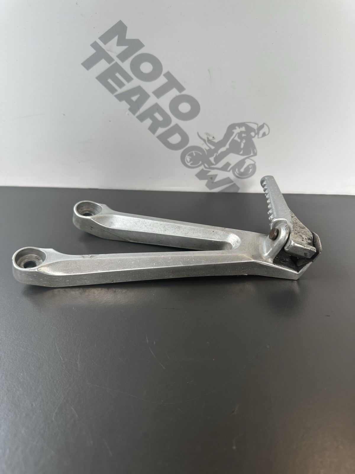 Honda CBR1000RR Fireblade Left pillion footrest Left Foot Hanger 2004-2005 OEM