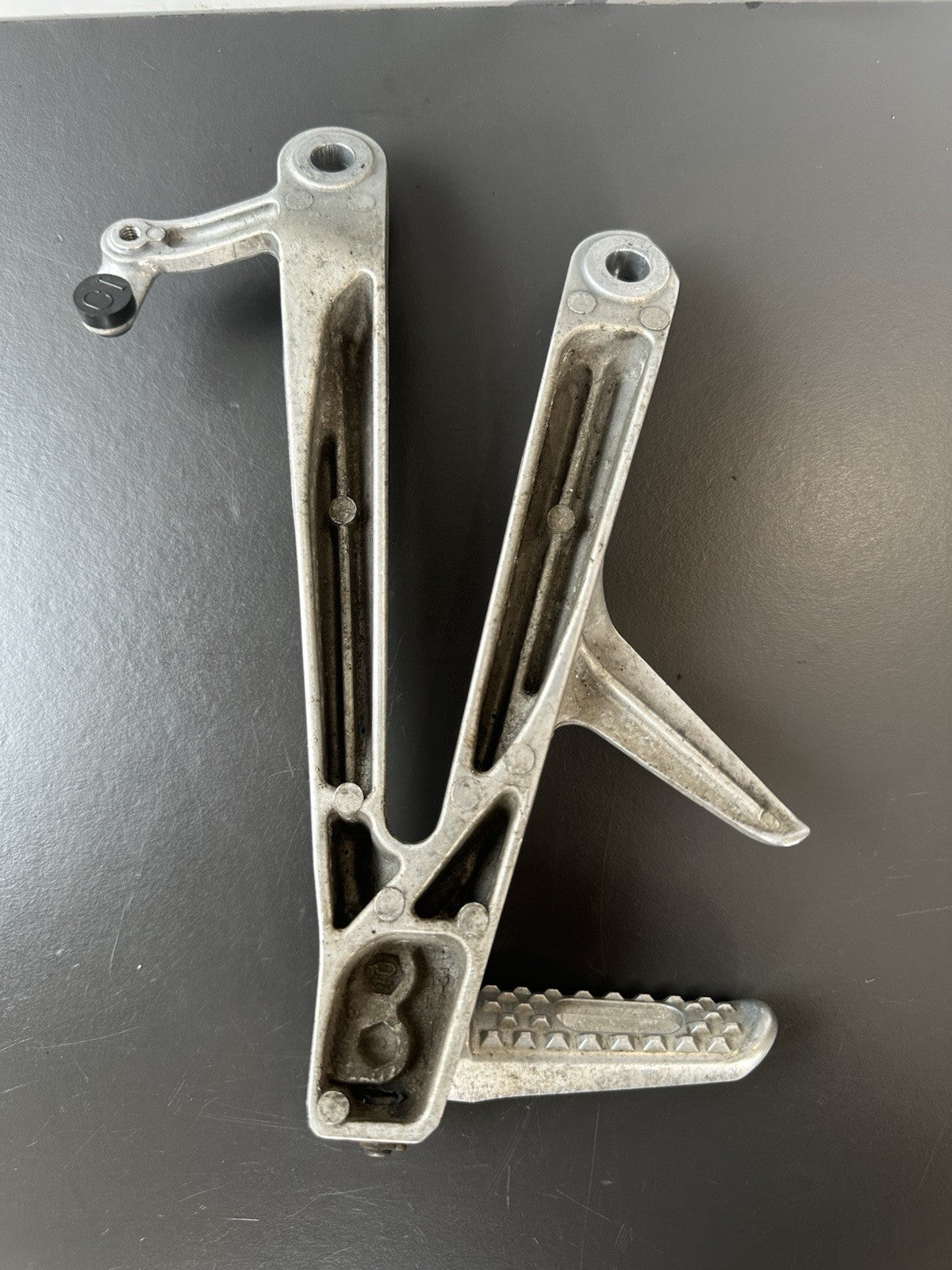 Honda CBR1000RR Fireblade right pillion footrest Right Foot Hanger 2004-2005 OEM