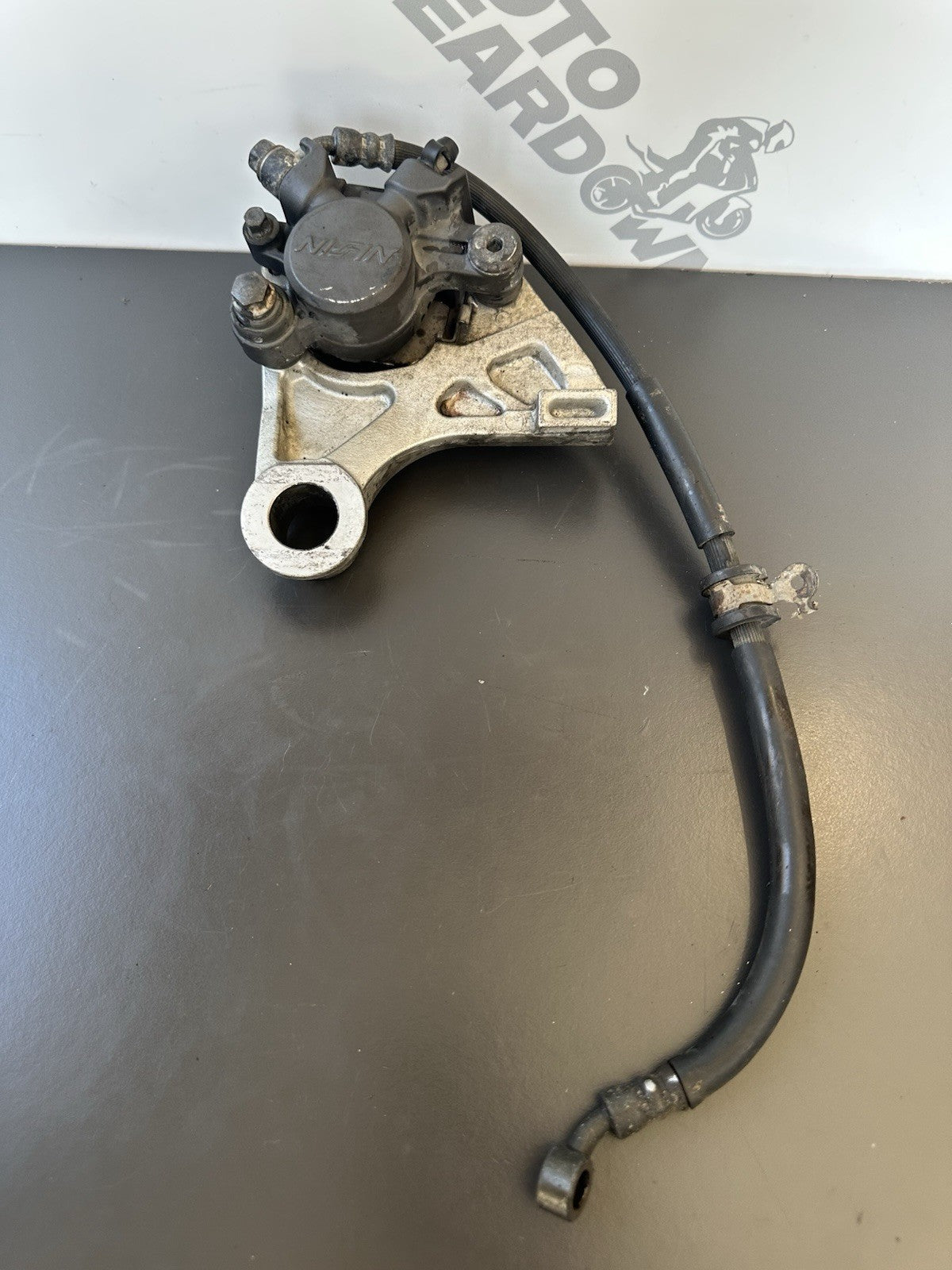 HONDA CBR1000RR REAR BRAKE CALIPER WITH BRACKET 2004 2005 RR4 RR5 CBR1000RR OEM