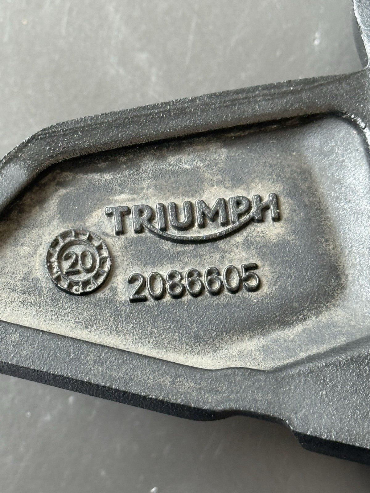 TRIUMPH TRIDENT 660 Left Rear Footrest Hanger - T2086605 2021-2024 Left Footrest