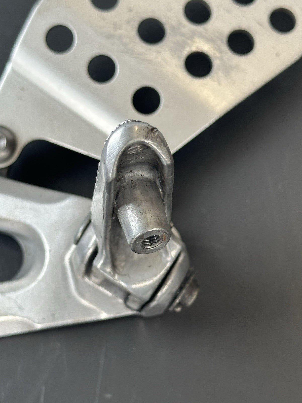 Honda CBR1000RR fireblade left front footrest hanger bracket peg 2004 - 2005 OEM