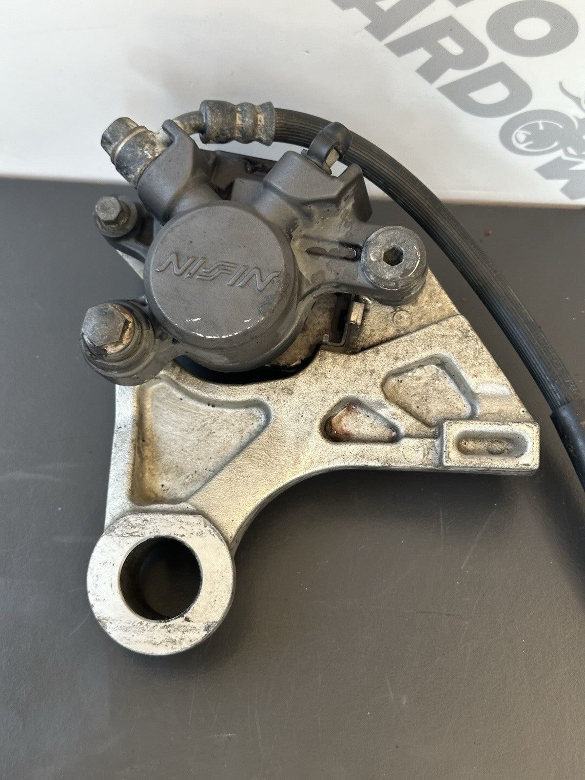 HONDA CBR1000RR REAR BRAKE CALIPER WITH BRACKET 2004 2005 RR4 RR5 CBR1000RR OEM
