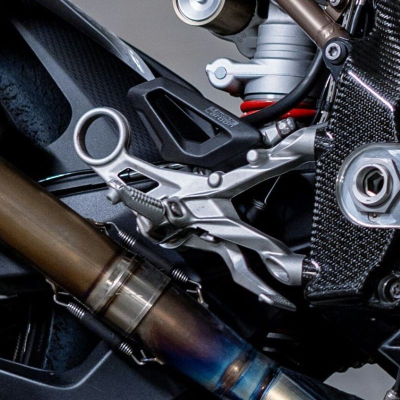 Motorcycle foot controls and pegs