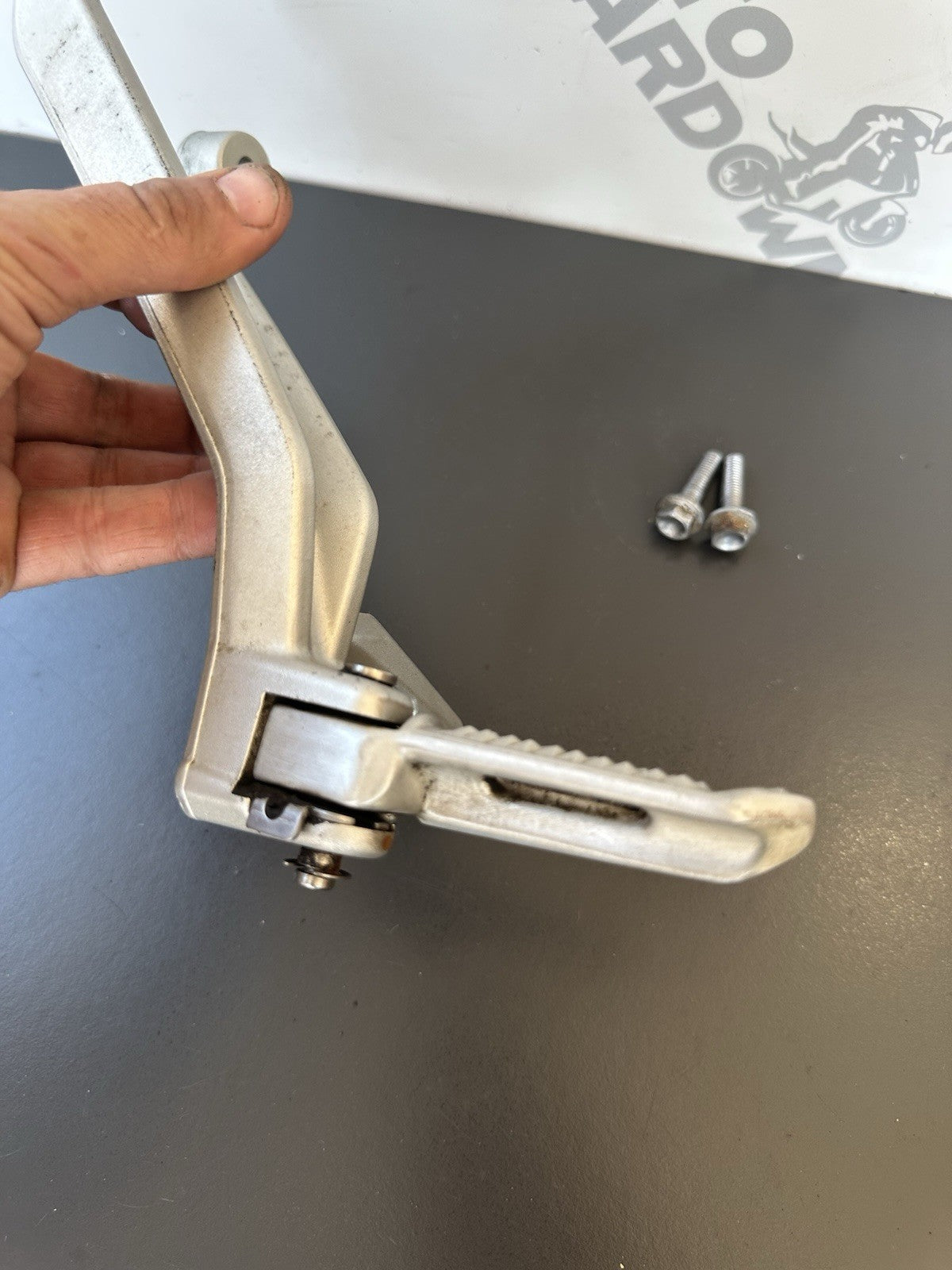 TRIUMPH STREET TRIPLE Left Pillion Footrest Hanger - 765R 765RS T2081987 2017-19