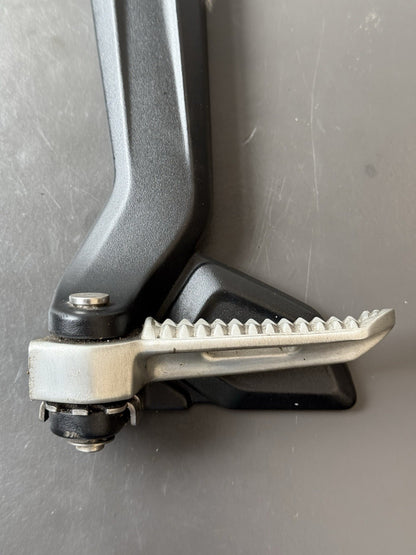 TRIUMPH TRIDENT 660 Left Rear Footrest Hanger - T2086605 2021-2024 Left Footrest