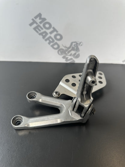 Honda CBR1000RR fireblade left front footrest hanger bracket peg 2004 - 2005 OEM