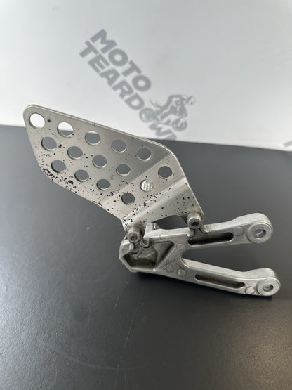 Honda CBR1000RR fireblade left front footrest hanger bracket peg 2004 - 2005 OEM