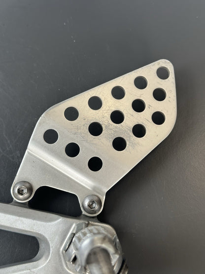 Honda CBR1000RR fireblade left front footrest hanger bracket peg 2004 - 2005 OEM