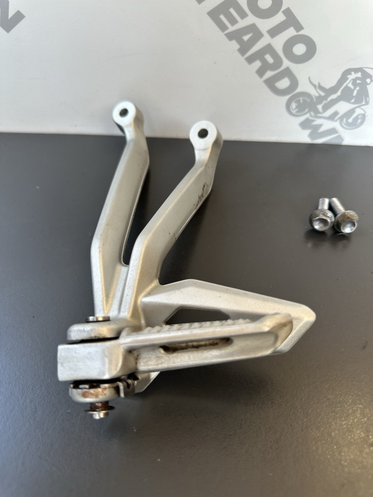 TRIUMPH STREET TRIPLE Left Pillion Footrest Hanger - 765R 765RS T2081987 2017-19