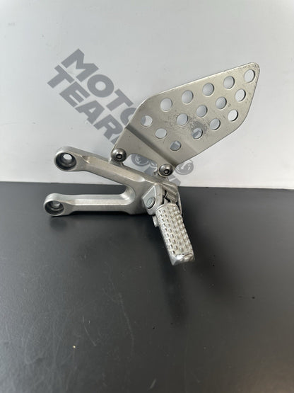 Honda CBR1000RR fireblade left front footrest hanger bracket peg 2004 - 2005 OEM