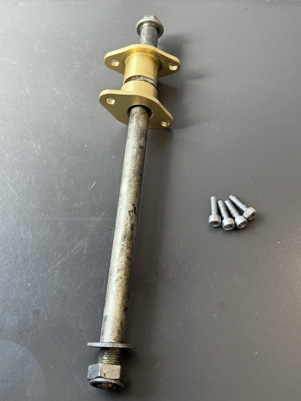 TRIUMPH STREET TRIPLE 675R SWINGARM SPINDLE  YEAR 2010 675R SWINGARM Spindle OEM