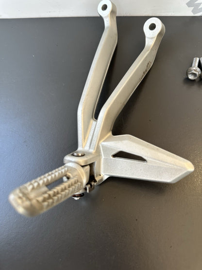 TRIUMPH STREET TRIPLE Left Pillion Footrest Hanger - 765R 765RS T2081987 2017-19