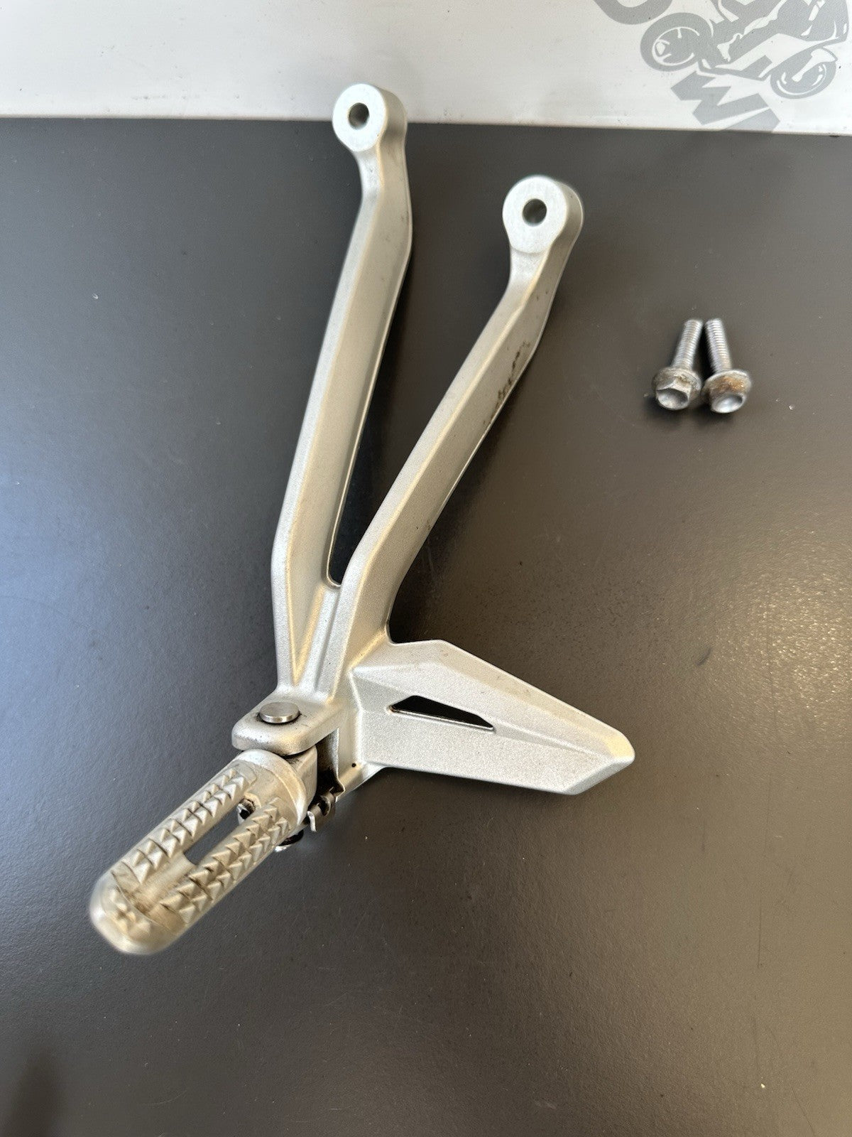 TRIUMPH STREET TRIPLE Left Pillion Footrest Hanger - 765R 765RS T2081987 2017-19