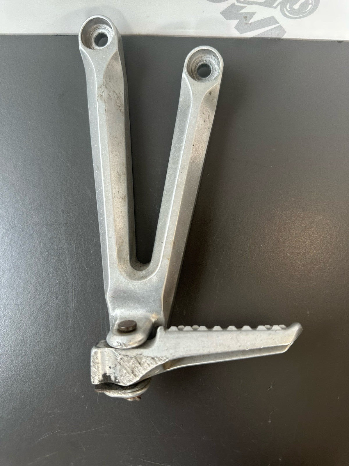 Honda CBR1000RR Fireblade Left pillion footrest Left  Foot Hanger 2004-2005 OEM