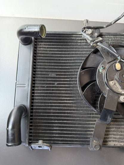 TRIUMPH TRIDENT 660 Radiator And Fan 2021-2024 Water Tight But Slight Kinked OEM