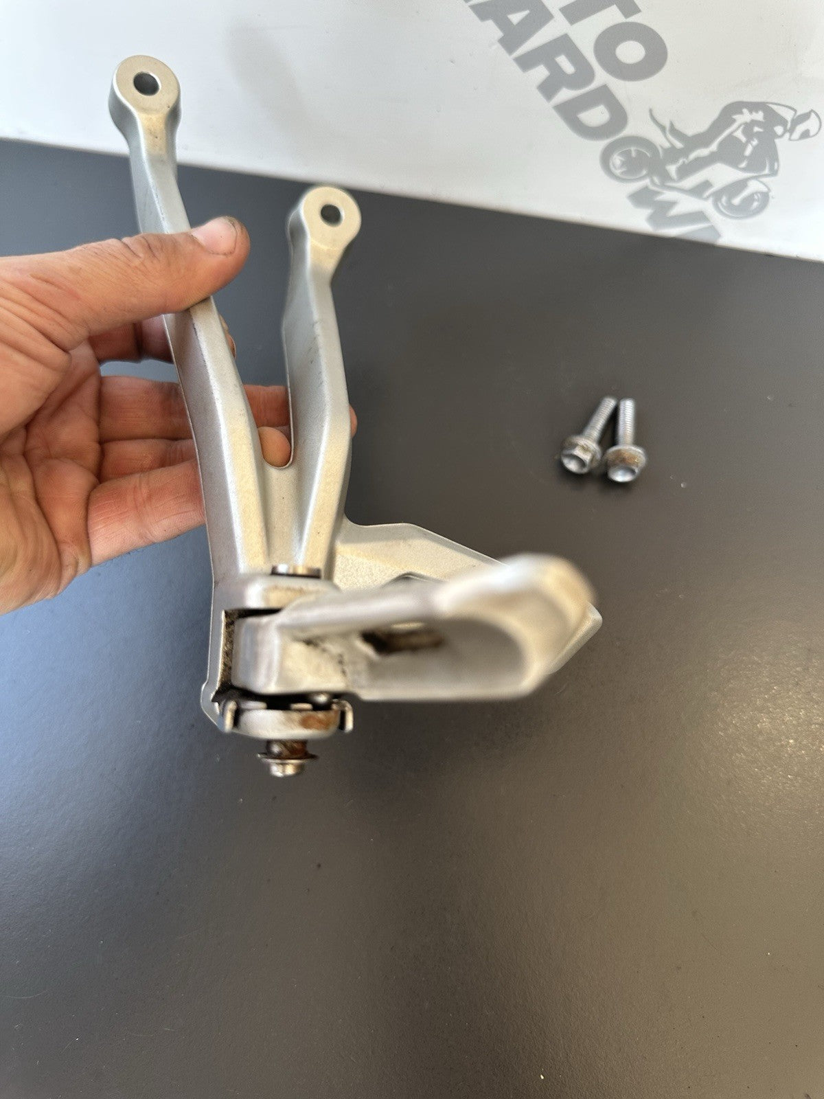 TRIUMPH STREET TRIPLE Left Pillion Footrest Hanger - 765R 765RS T2081987 2017-19