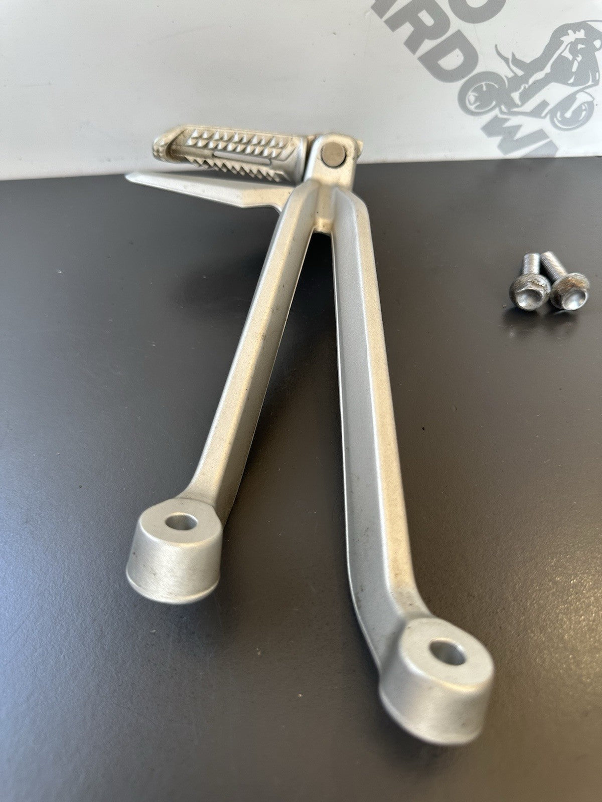 TRIUMPH STREET TRIPLE Left Pillion Footrest Hanger - 765R 765RS T2081987 2017-19