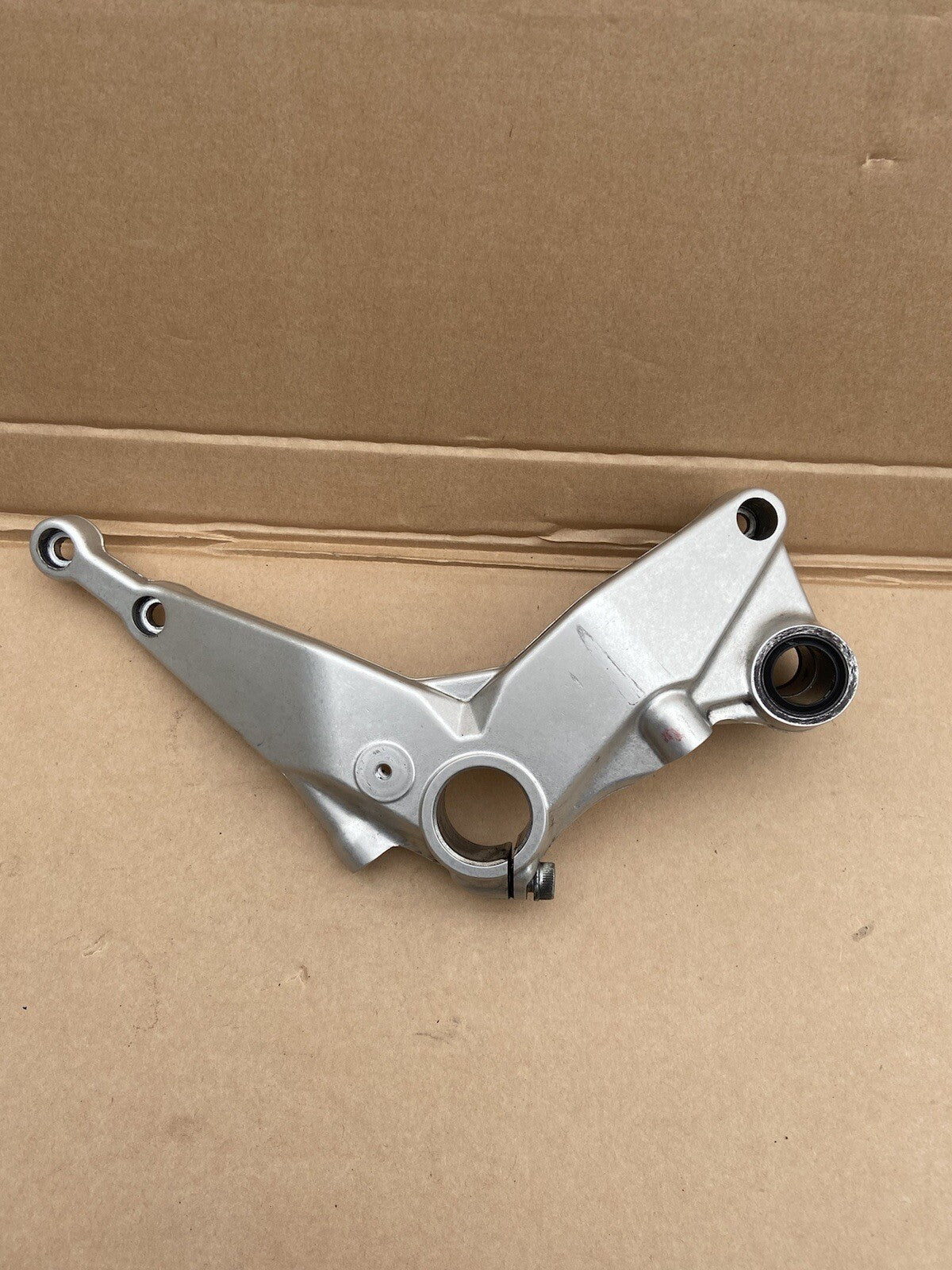 DUCATI PANIGALE 1199 LEFT FOOTREST HOLDER BRACKET SUSPENSION PIVOT 8293A432A OEM