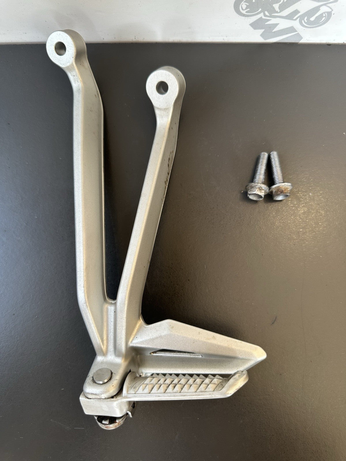 TRIUMPH STREET TRIPLE Left Pillion Footrest Hanger - 765R 765RS T2081987 2017-19